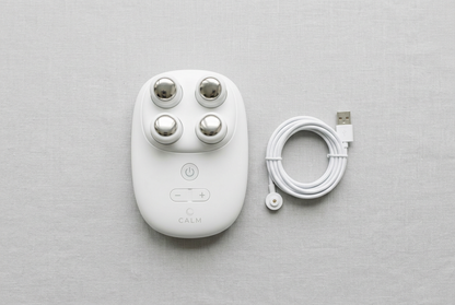 4-Head Cervical Neck Massager flat lay with USB charging cable